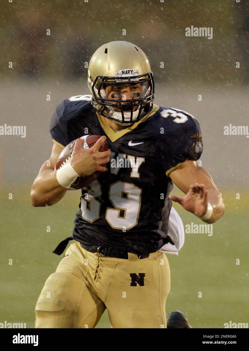 Navy fullback Alexander Teich carries the ball against Wake Forest