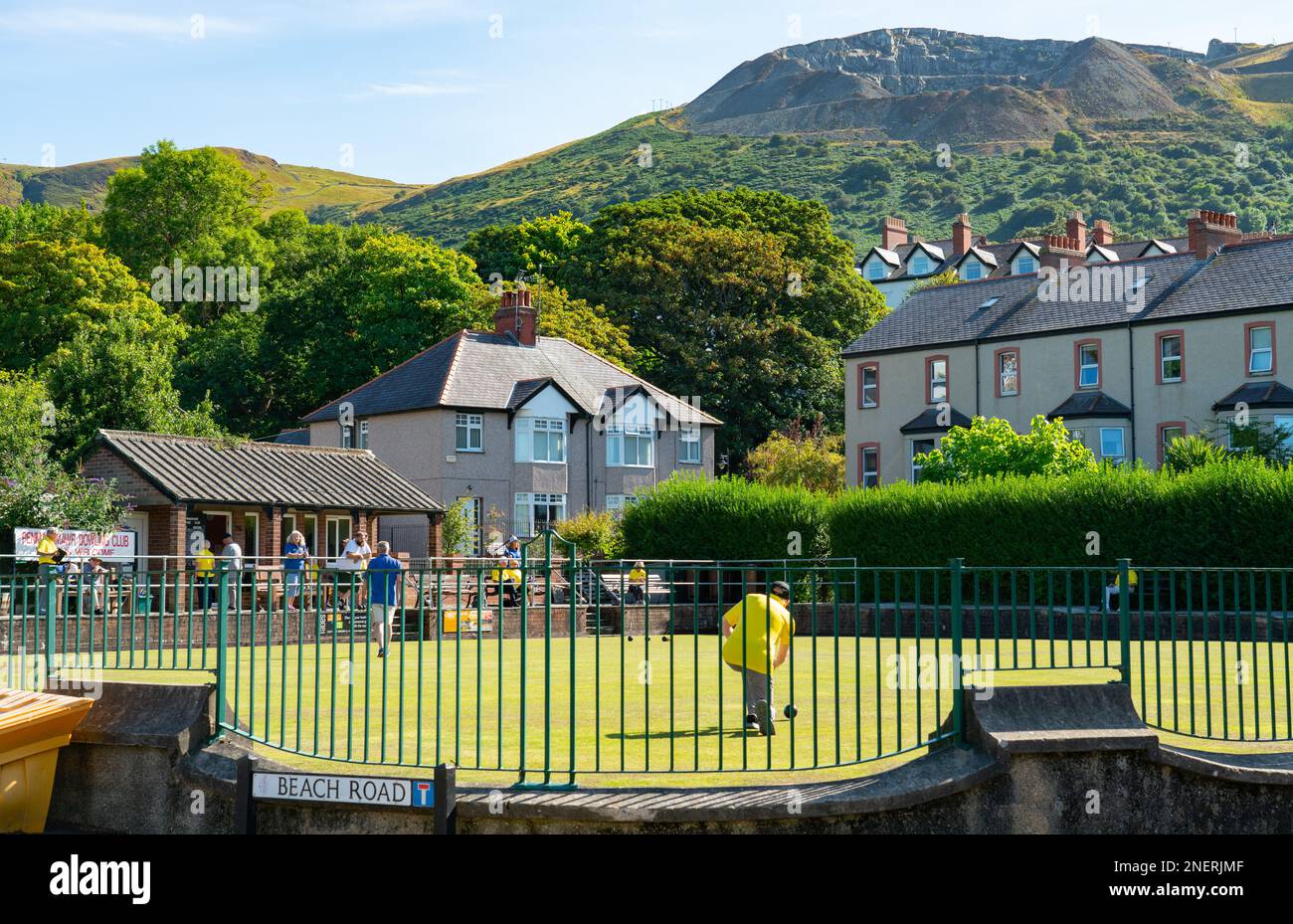 Penmaenmawr Bowling Club, in the shadow of Penmaenmawr Mountain and quarry, North Wales. Image taken in August 2022. Stock Photo