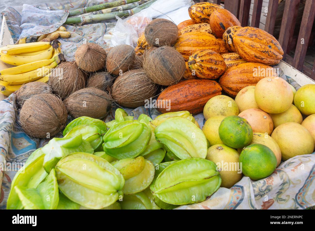 Selection of tropical fruits on roadside stall, Soufrière, Soufrière District, Saint Lucia, Lesser Antilles, Caribbean Stock Photo