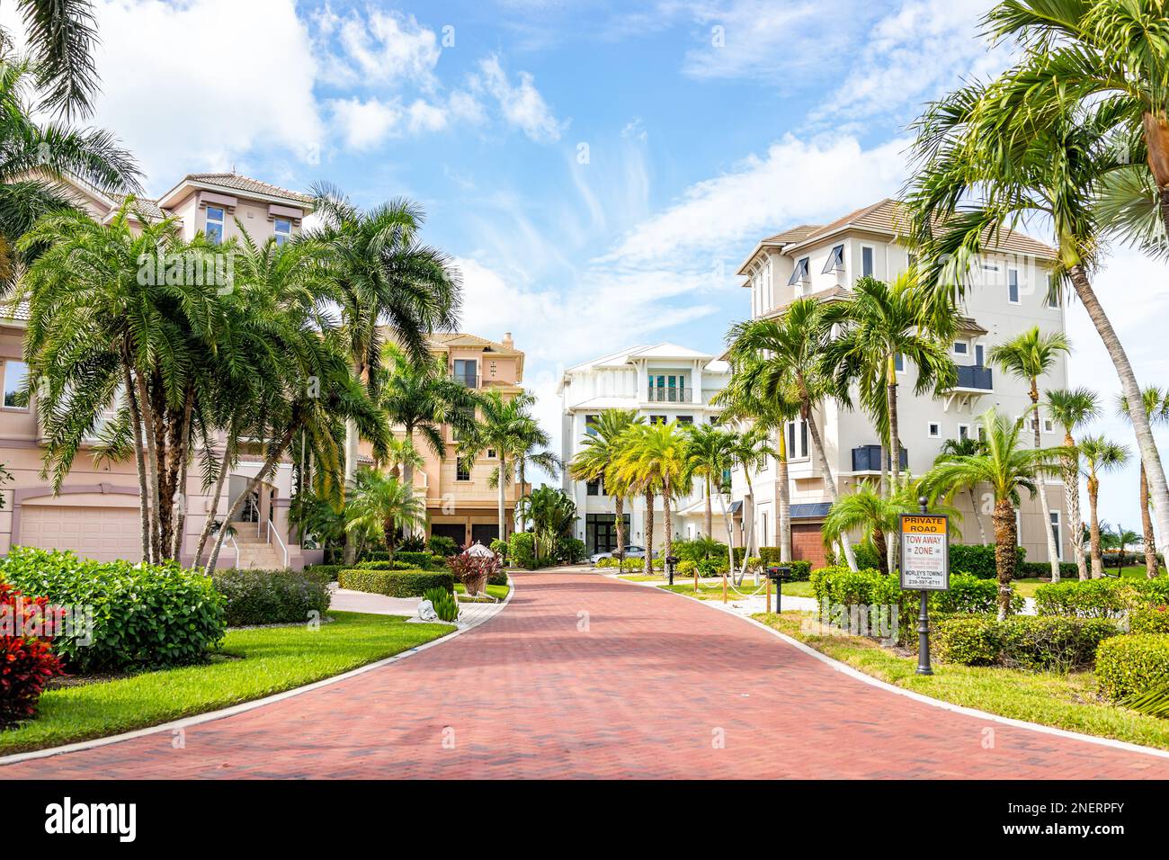 Bonita Springs, USA - November 2, 2021: Barefoot beach boulevard road residential community in Florida with luxury houses real estate property homes i Stock Photo