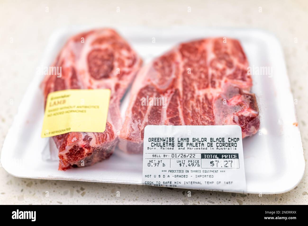 Naples, USA - January 23, 2022: Publix supermarket store Greenwise antibiotics free raised natural lamb shoulder blade chops, raw meat sign label in S Stock Photo