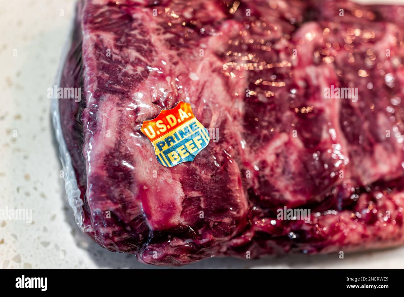 Naples, USA - May 11, 2022: Prime USDA beef sticker on whole packaged roast New York strip red meat steak by Costco bulk brand Stock Photo