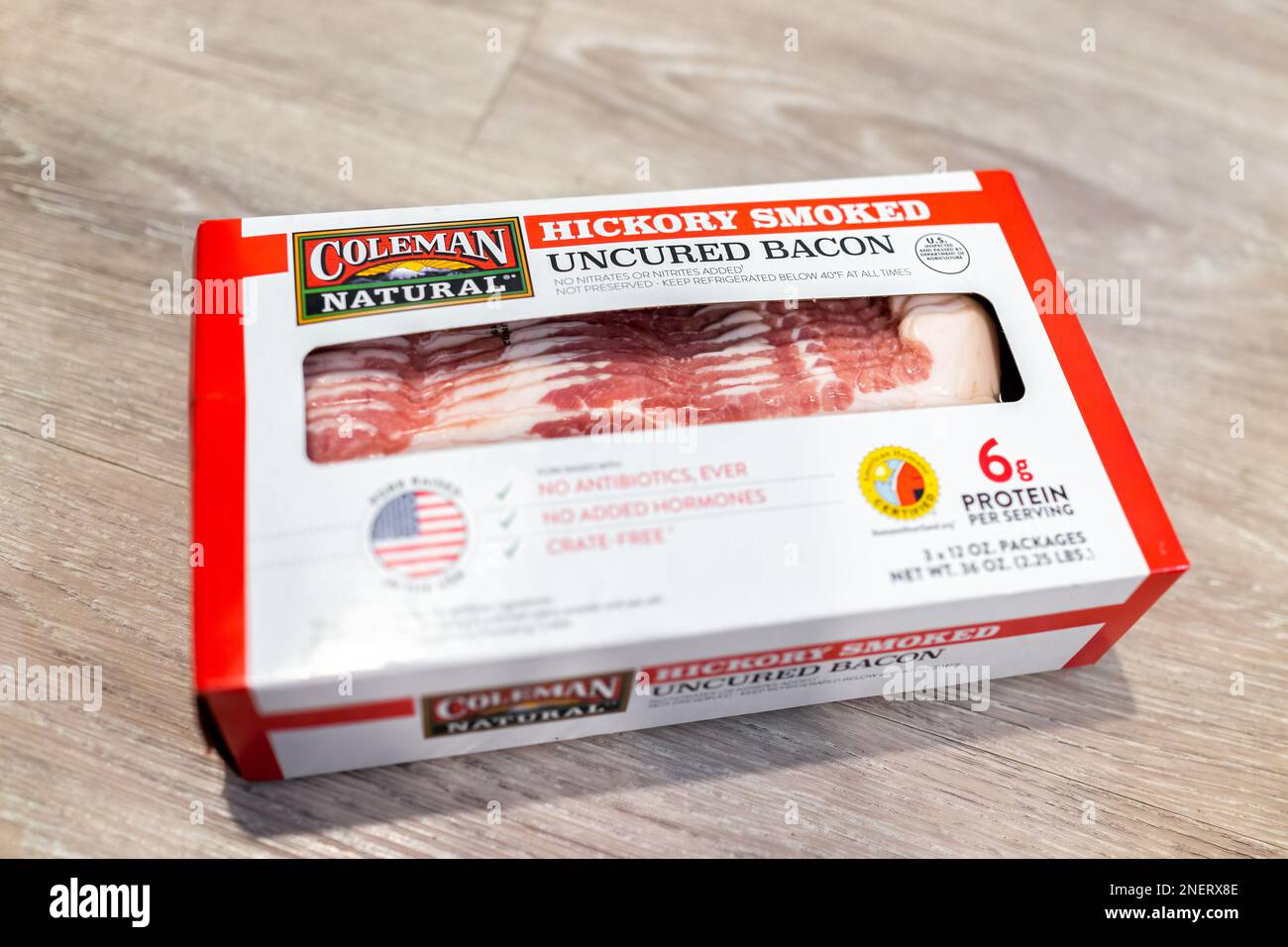 Naples, USA - May 17, 2022: Sign label for product of bulk Coleman natural hickory smoked uncured bacon storebought at Costco with no nitrates Stock Photo