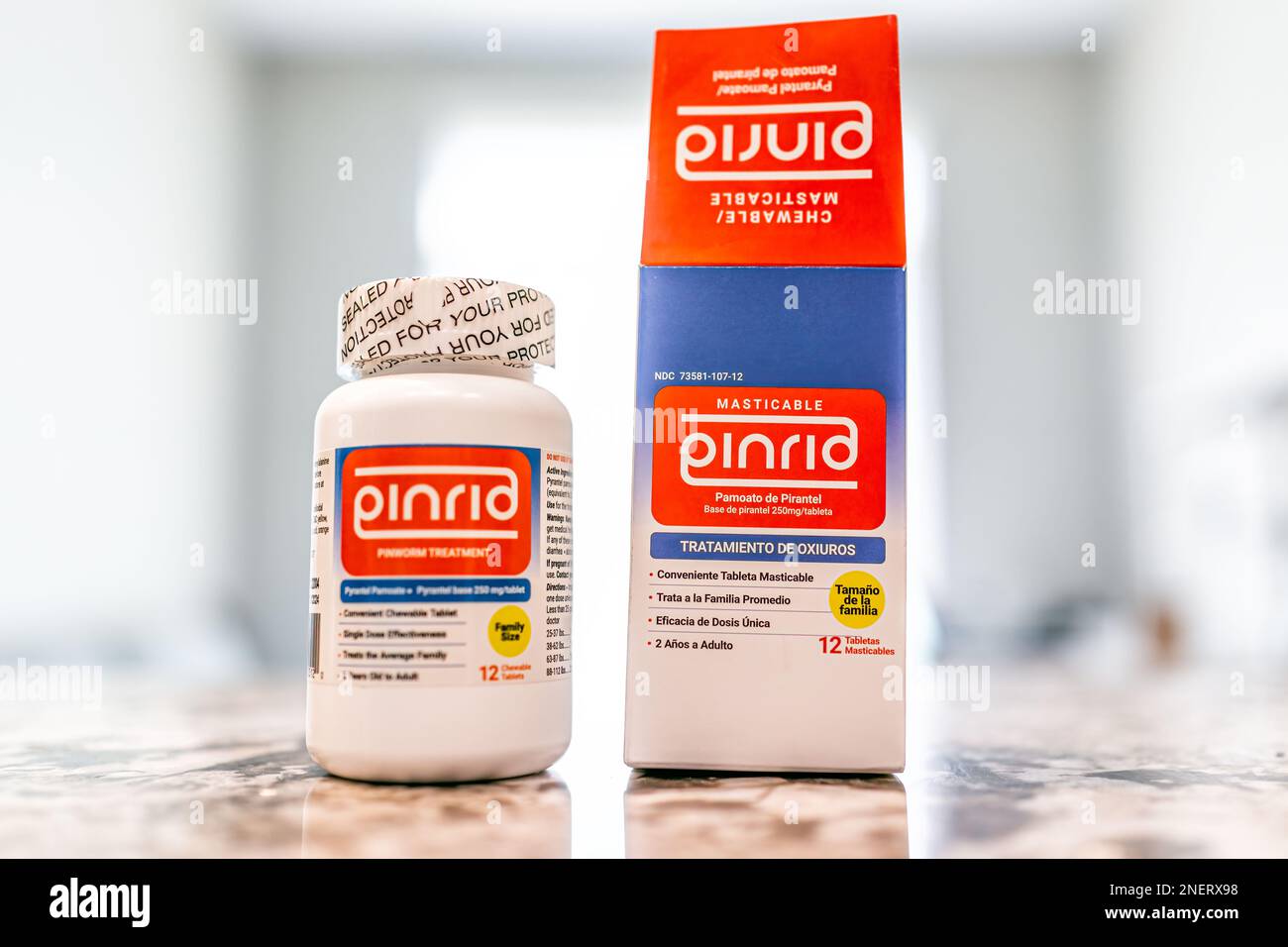 Avon, USA - June 17, 2022: Closeup of pinrid brand of over the counter pinworm treatment medication with sign label in spanish Stock Photo