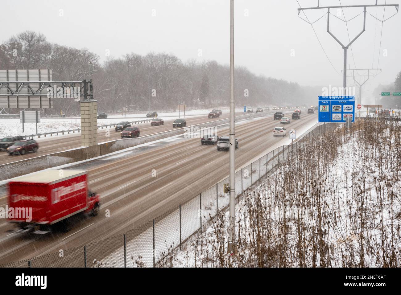 Photograph of highway traffic taken during a winter snow storm. Madison, Wisconsin, USA Stock