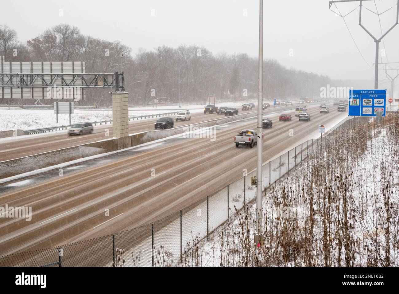 Photograph of highway traffic taken during a winter snow storm. Madison, Wisconsin, USA Stock