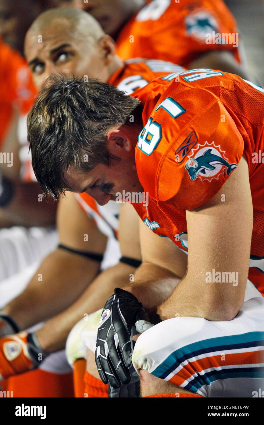 Miami Dolphins tight end Joey Haynos sits on the bench during an NFL  football game between the New York Jets and the Miami Dolphins Tuesday,  Oct. 13, 2009 in Miami. (AP Photo/Wilfredo
