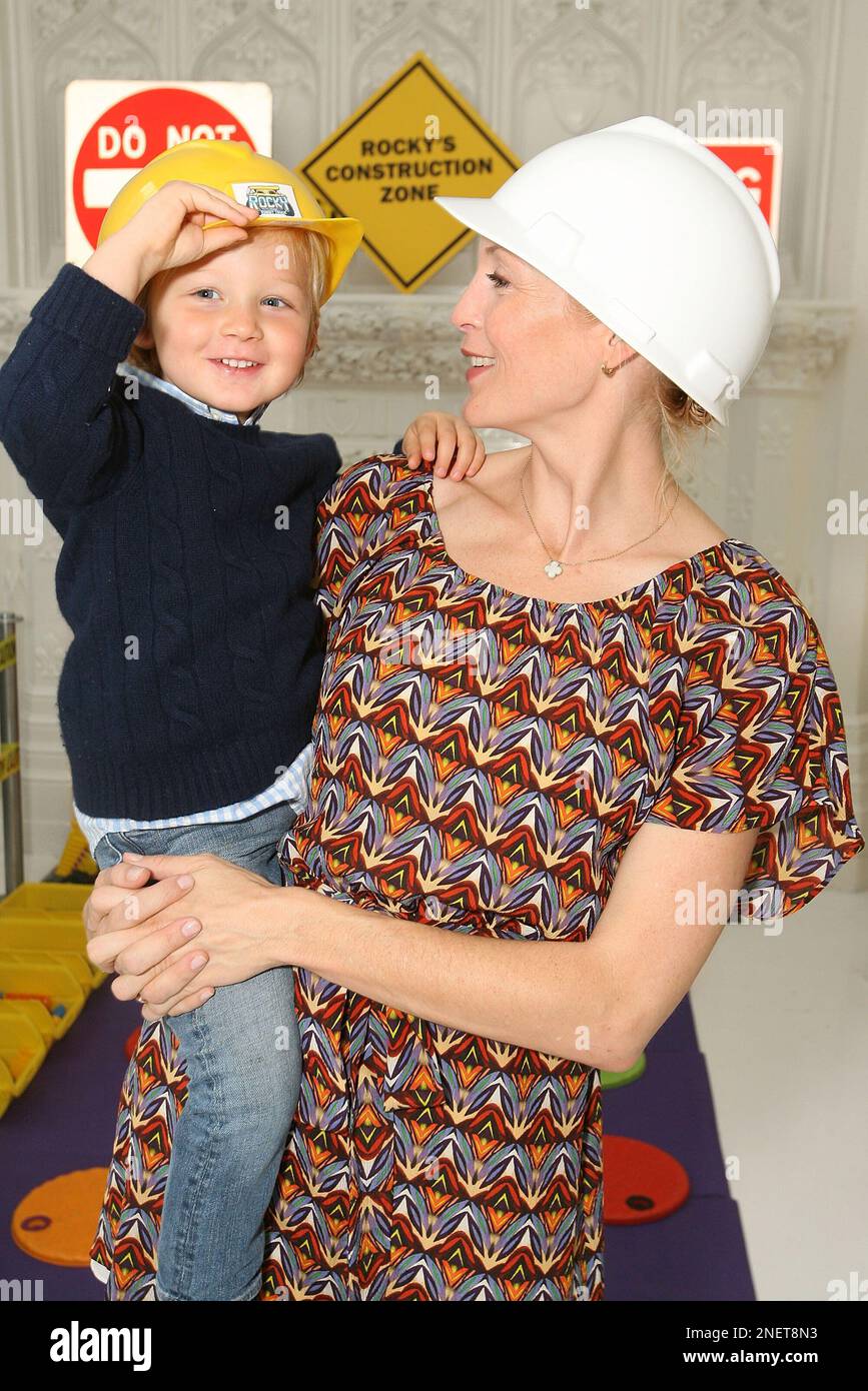 Kelly Rutherford and son Hermes attends a Rocky the Robot Truck themed ...