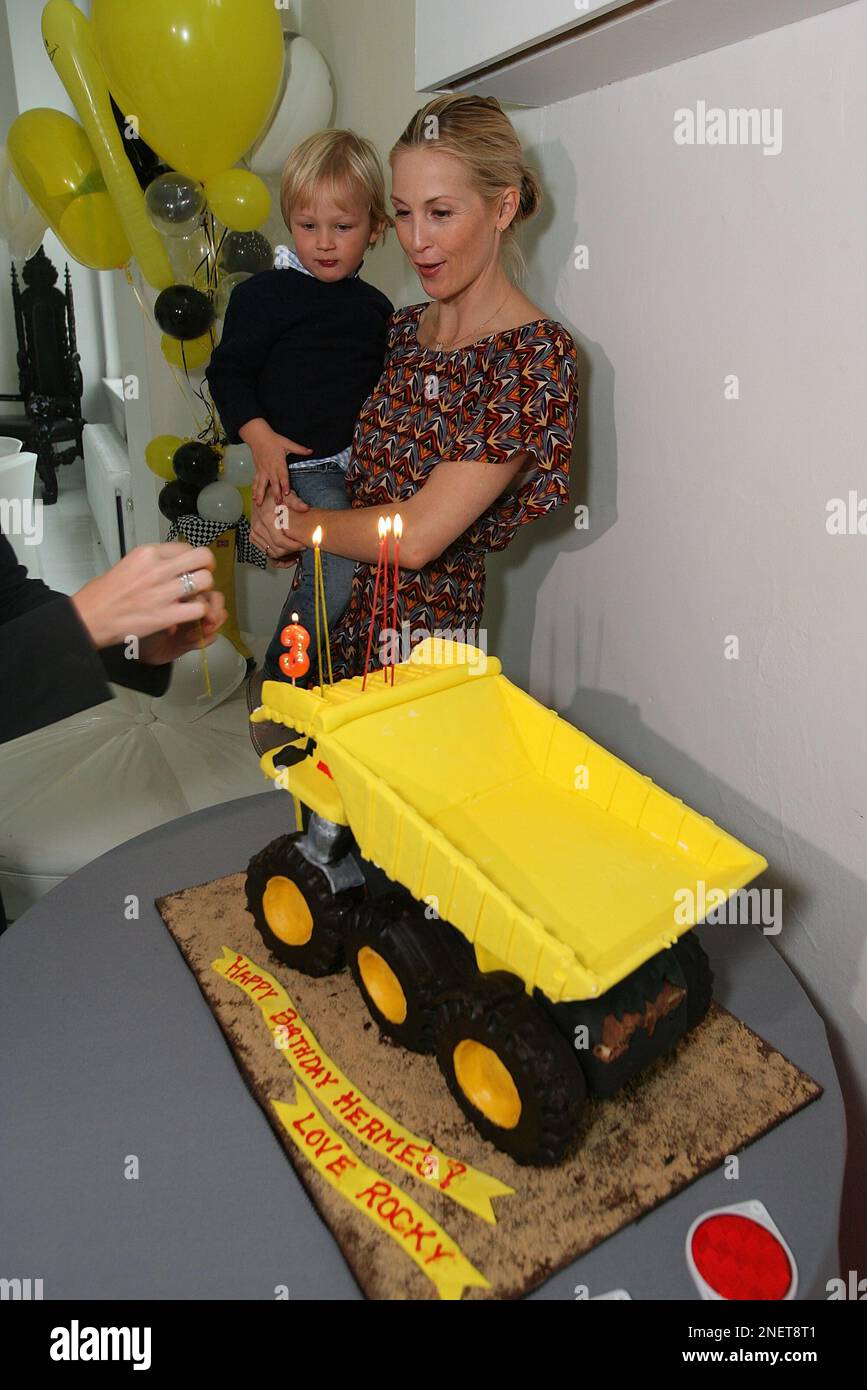 Kelly Rutherford and son Hermes attend a Rocky the Robot Truck themed ...
