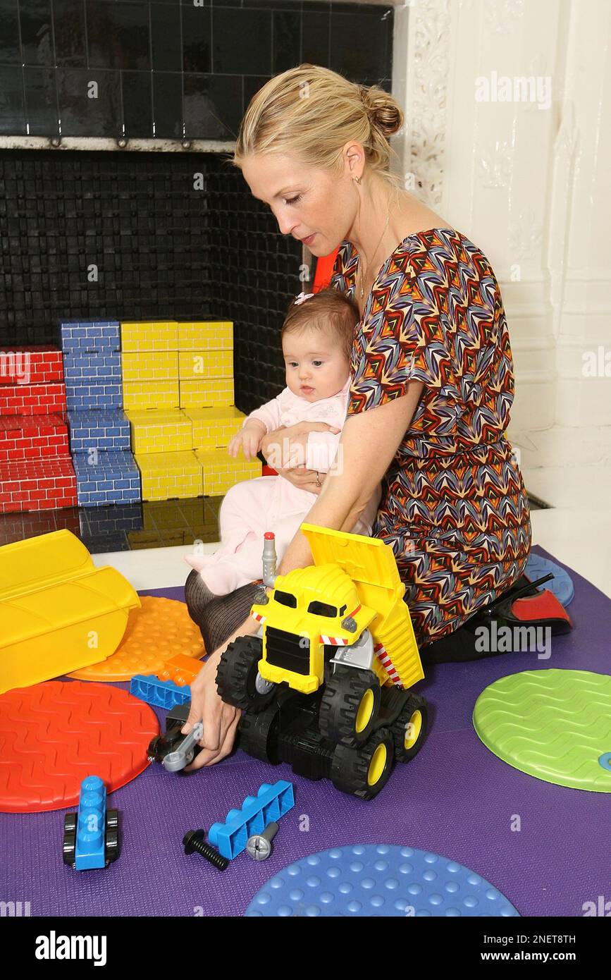 Kelly Rutherford and daughter Helena attend a Rocky the Robot Truck ...