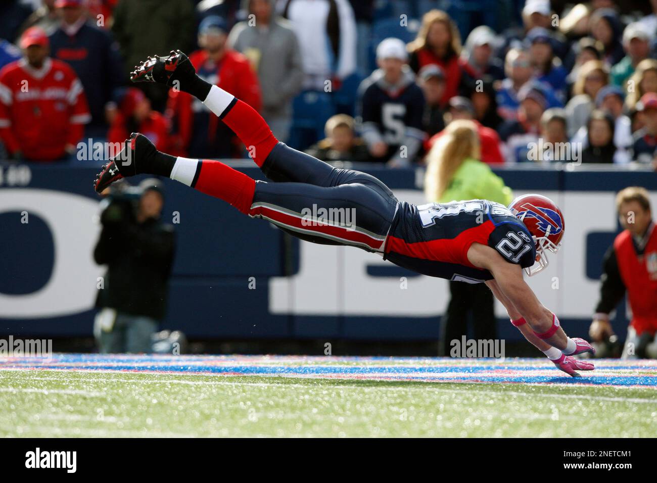 Buffalo Bills special teams player John Wendling is airborne on a