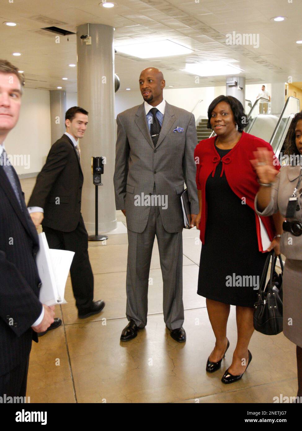 Former NBA star Alonzo Mourning gets off the subway on Capitol Hill in