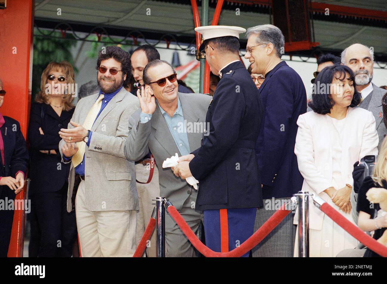 Academy Award-winning actor Jack Nicholson pokes his head out from an ...