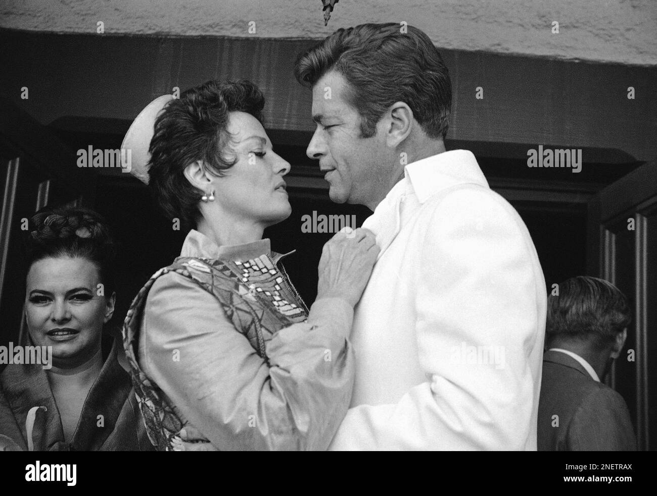 Actress Jane Russell and her bridegroom, actor Roger Barrett, pause