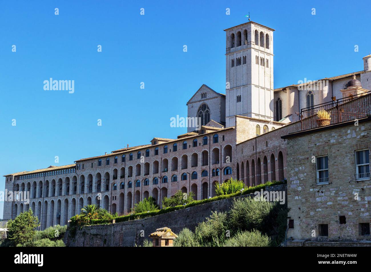 View from the outside of the imposing Basilica of San Francesco in Assisi Stock Photo