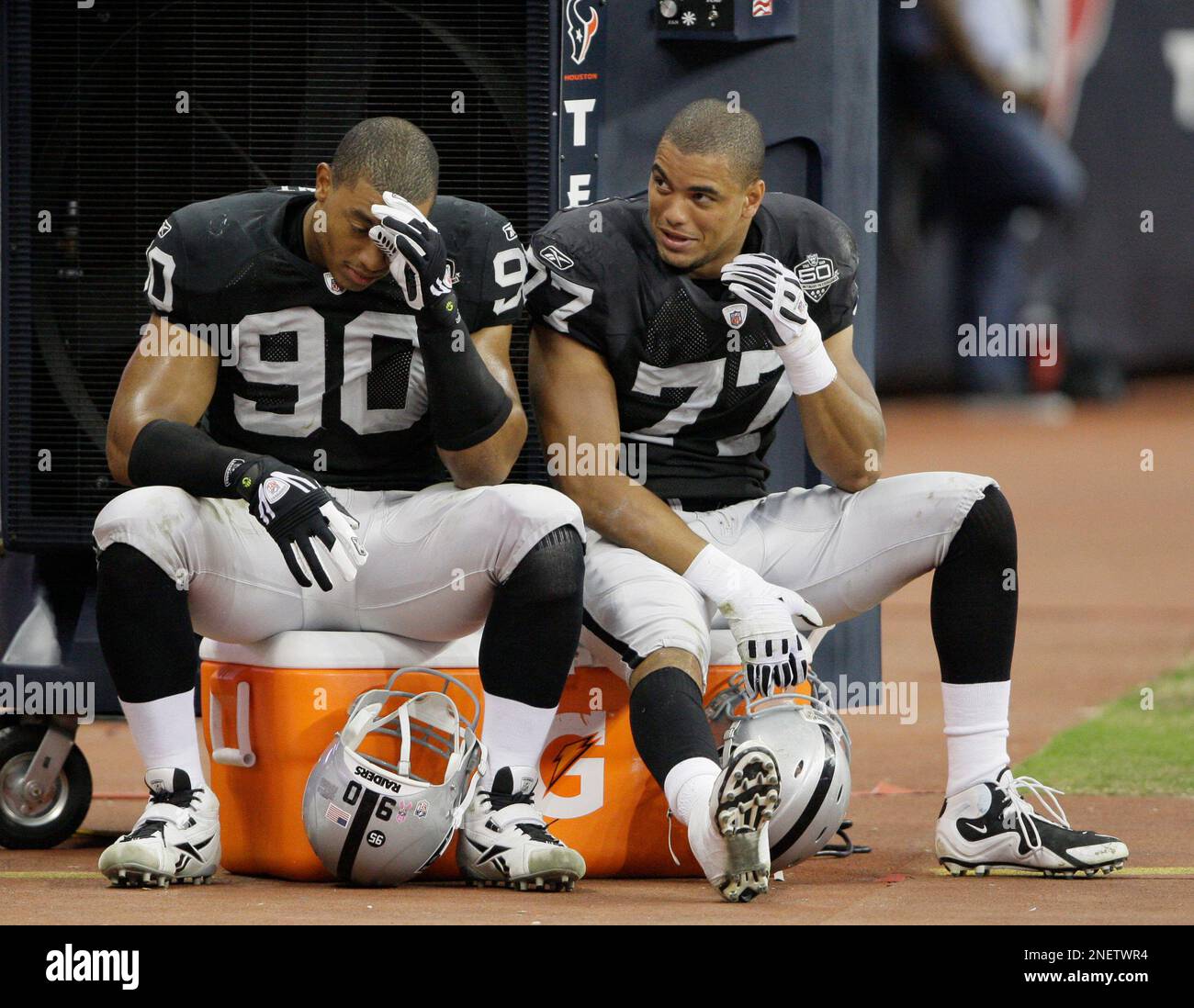 Oakland Raiders' Desmond Bryant (90) and Matt Shaughnessy (77) during the  first quarter of a NFL football game Sunday, Oct. 4, 2009 in Houston. (AP  Photo/David J. Phillip Stock Photo - Alamy, image size:1300x1098