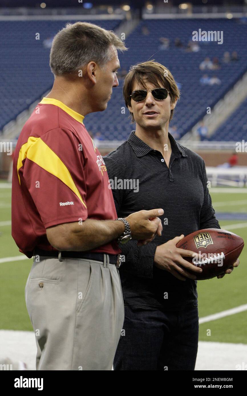 Actor Tom Cruise, right, and Washington Redskins head coach Jim Zorn