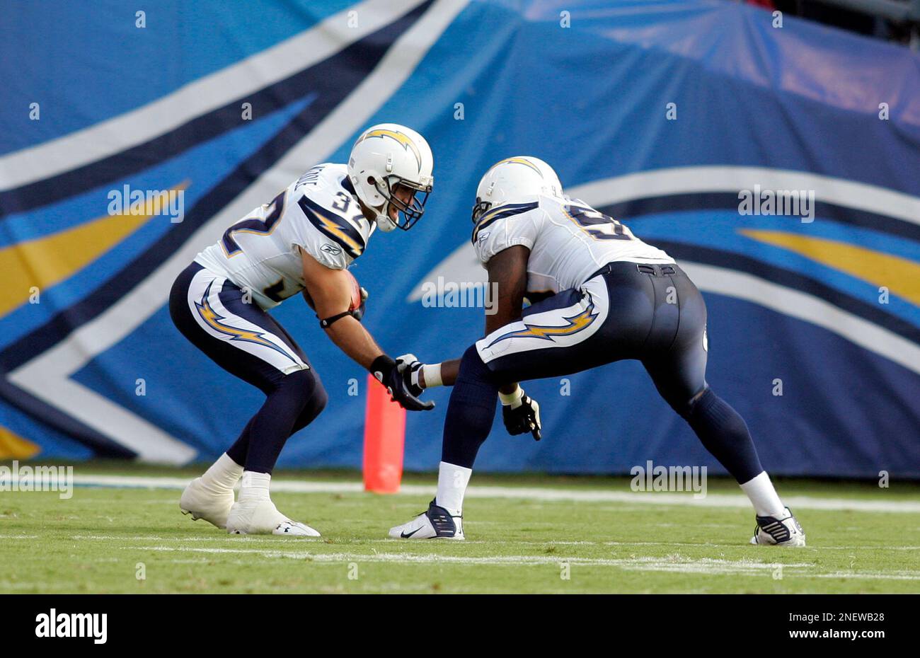 San Diego Chargers' Eric Weddle, left, and Shaun Phillips, right, celebrate during an NFL