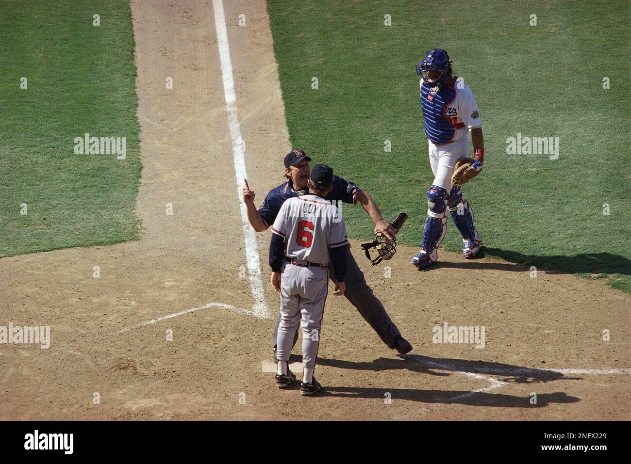 Home plate umpire Bob Davidson ejects Atlanta Braves manager Bobby Cox ...