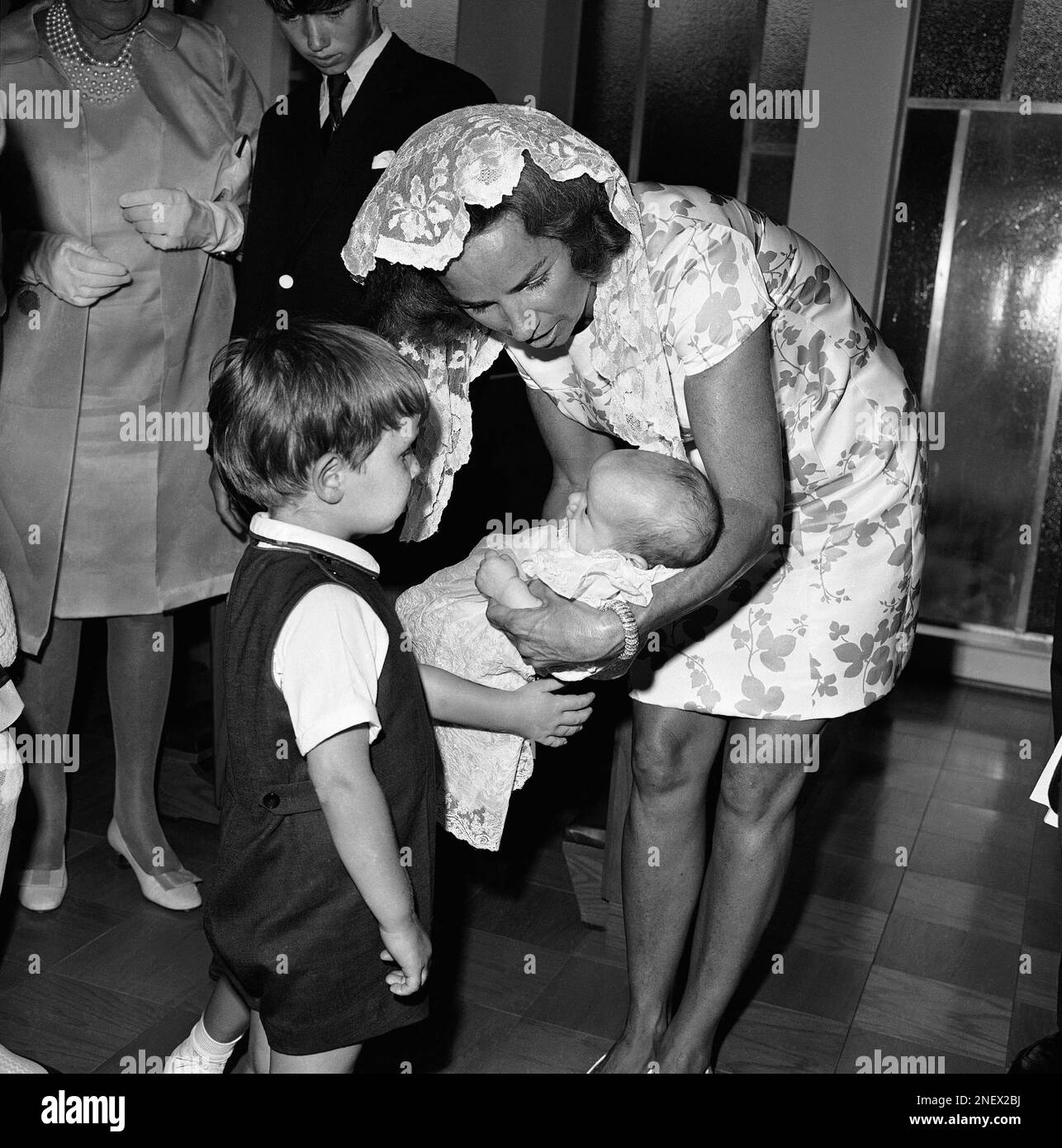 Ethel Kennedy, wife of Sen. Robert F. Kennedy, holds Douglas Harriman  Kennedy, the youngest son of the Kennedy family, on his baptism day, June  18, 1967, in St. Lukes Church in McLean,