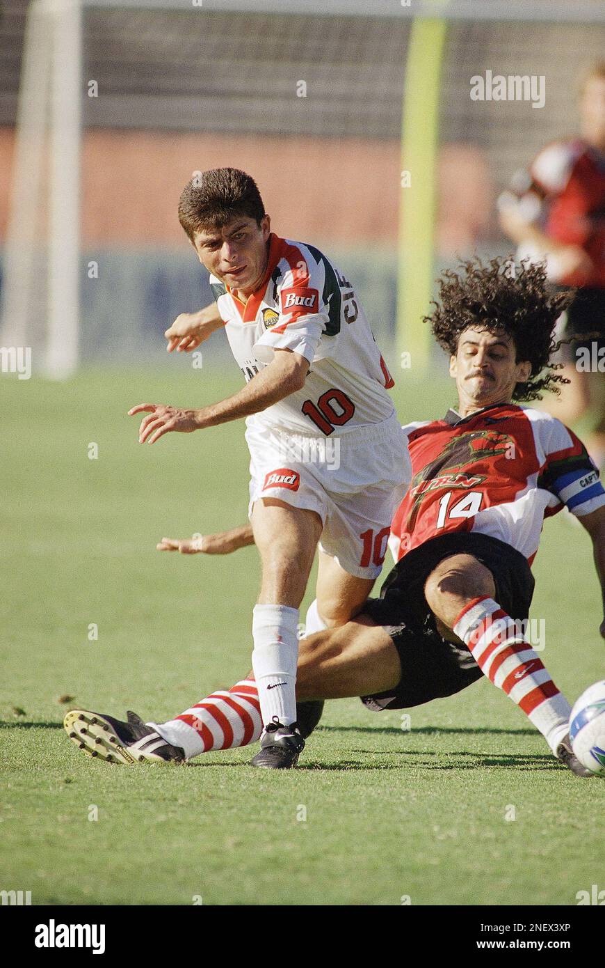 Mauricio Cienfuegos of the Los Angeles Galaxy, left, fights for the ball  with Leonel Alvarez of the Dallas Burn during the first half of their game,  Sunday, August 25, 1996 in Pasadena