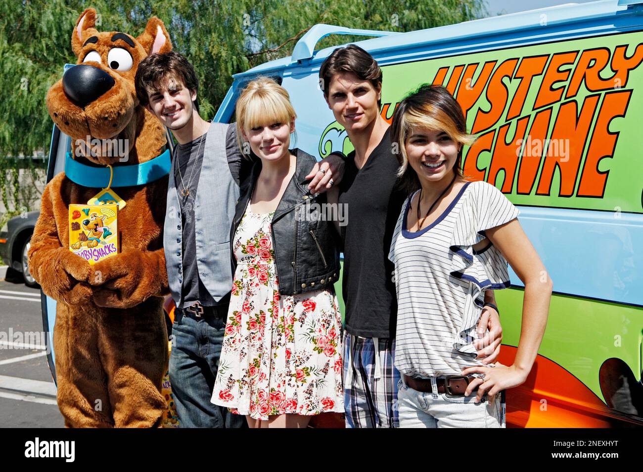 From left to right, cartoon character Scooby-Doo, actors Nick Palatas