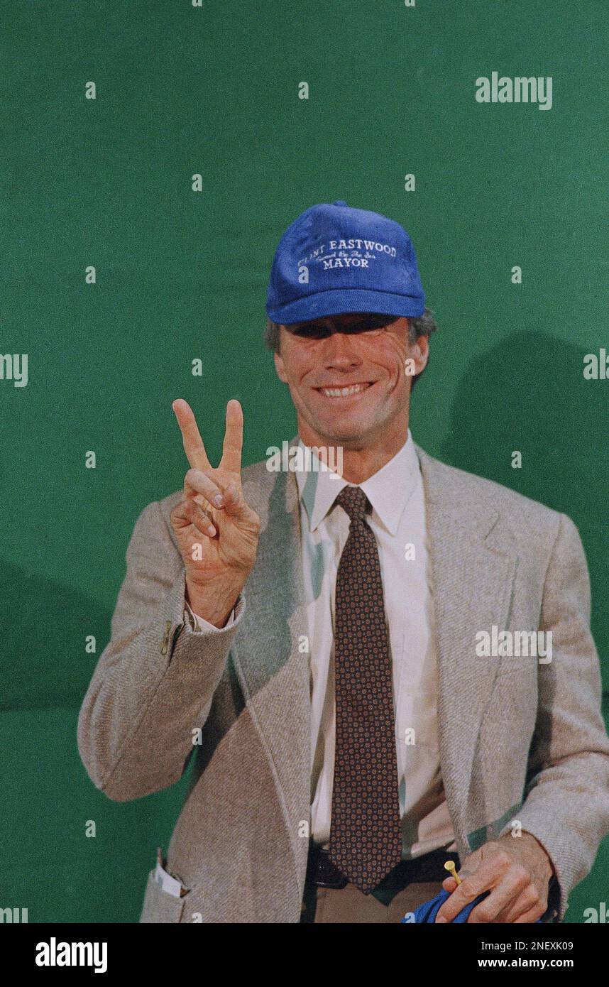 Actor Clint Eastwood gives the victory sign, Tuesday, April 9, 1986 after winning the election