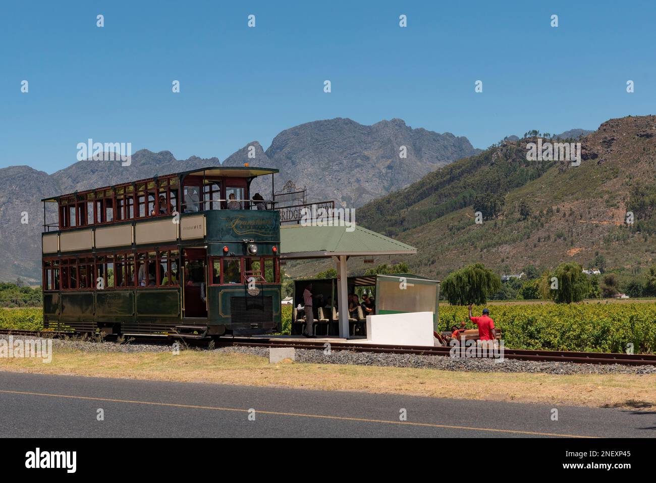 Franschhoek, Western Cape, South Africa. 2023. Tourists boarding a tram