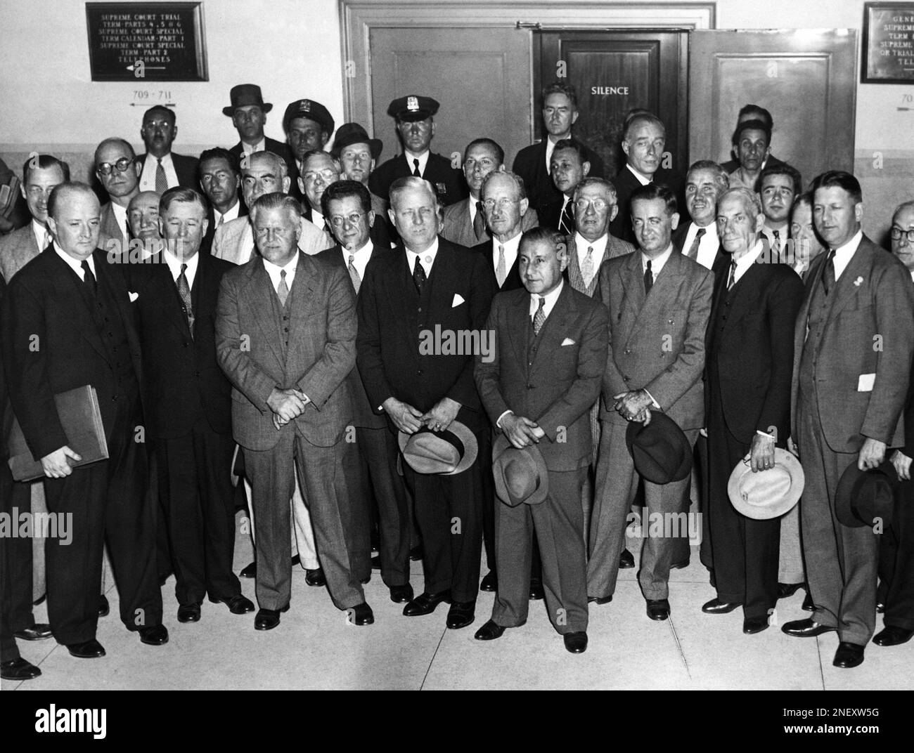 After returning an indictment against Bruno Richard Hauptmann for extortion  as the receiving of the $50,000 Lindbergh kidnap ransom money, the Bronx  County, New York grand jury which investigated the case posed