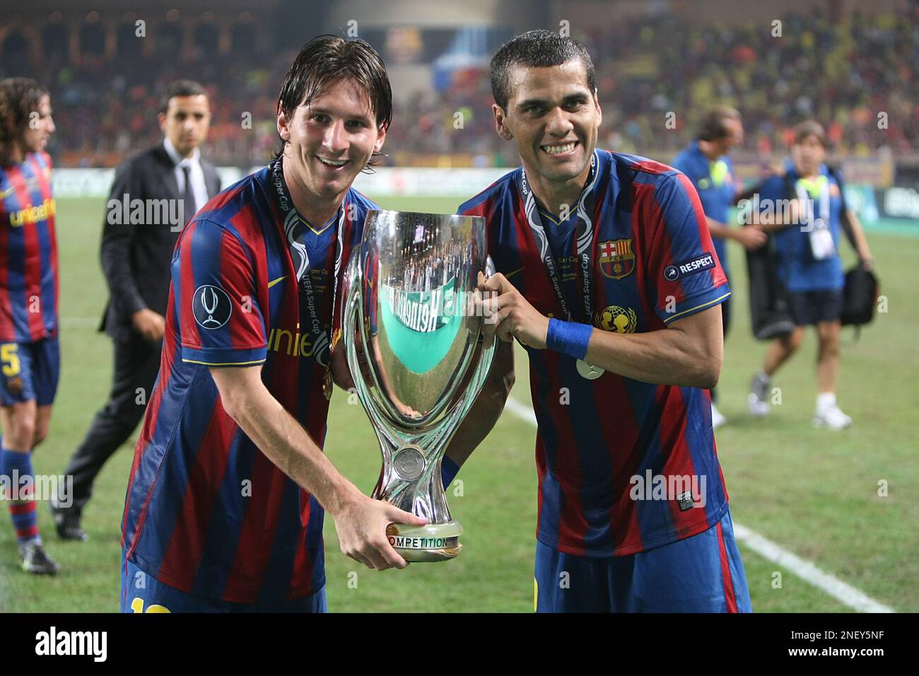 Barcelona's forward Lionel Messi, left, and Daniel Alves holds the