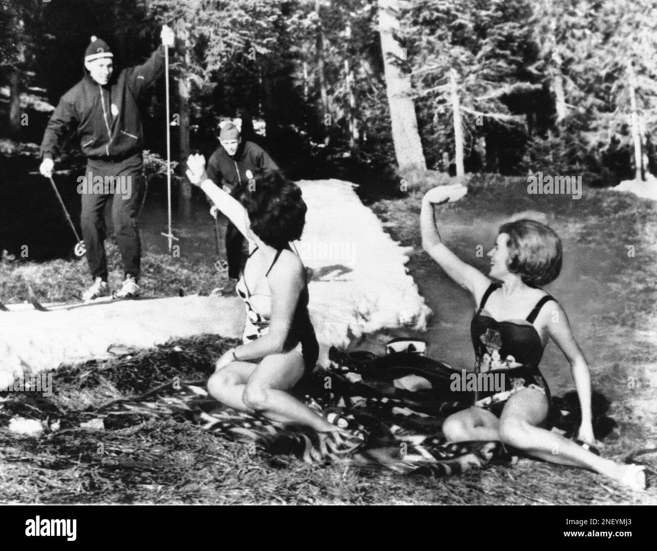 two-austrian-sunbathers-wave-to-norwegian-olympic-skiers-reidar
