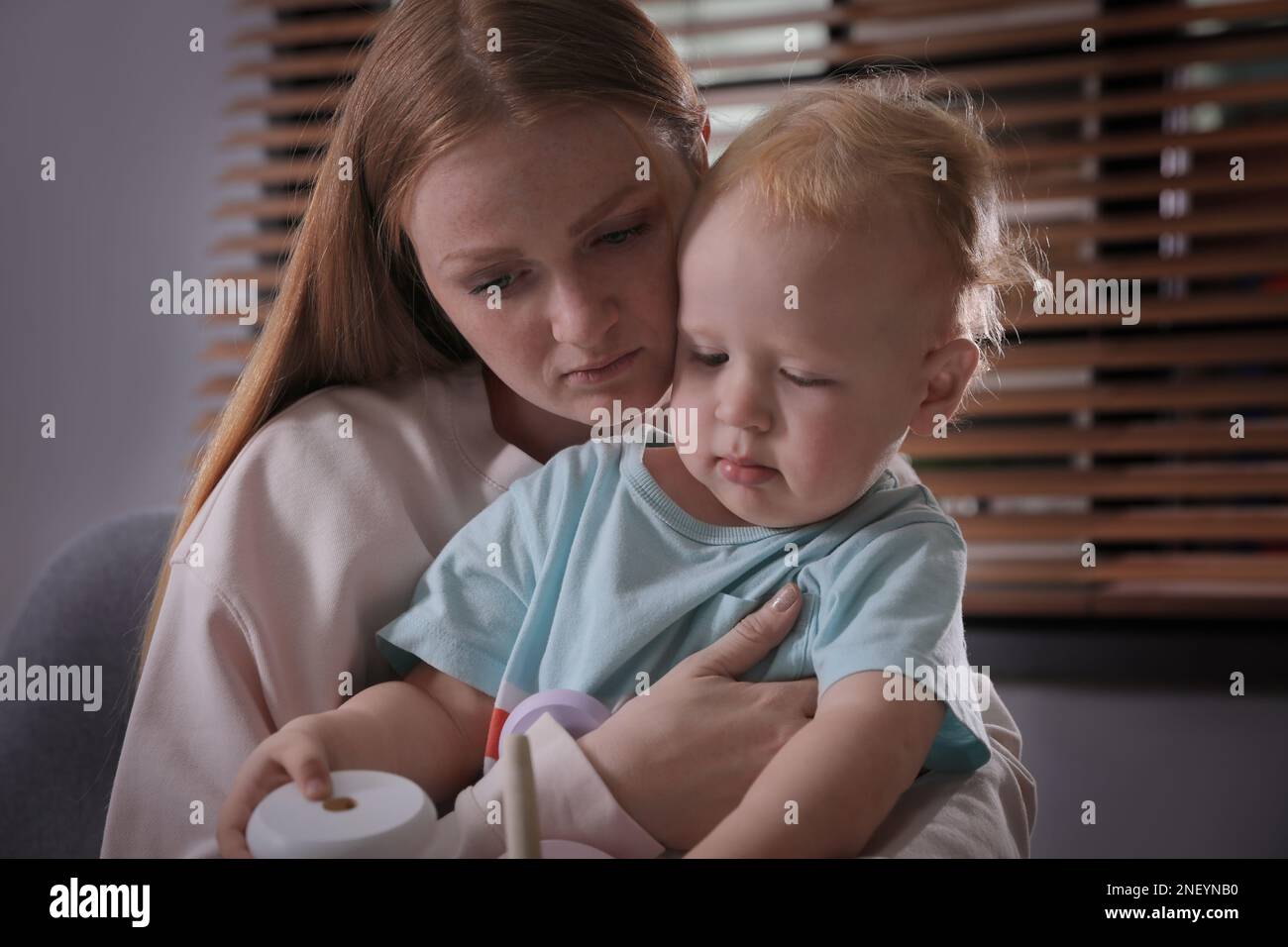Young single mother with her child at home Stock Photo Alamy