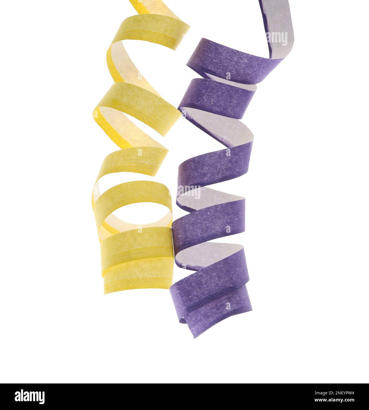Bright serpentine streamers on white background. Festive decor Stock