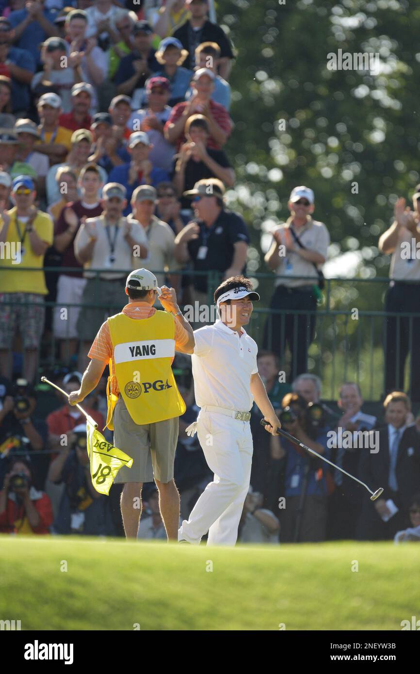 Y.E. Yang, of South Korea, celebrates after winning the 91st PGA ...