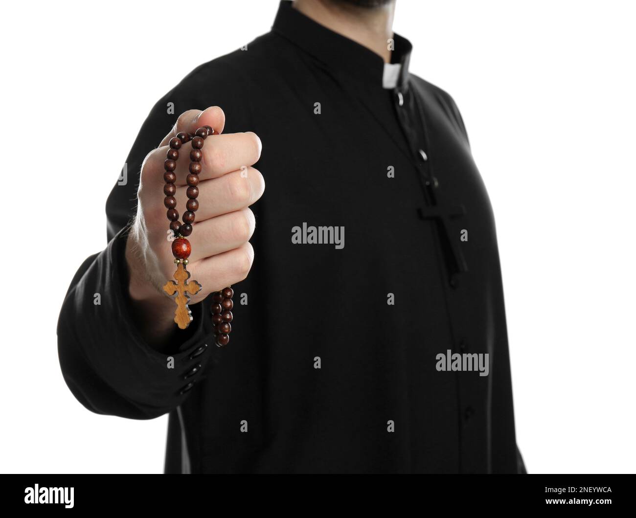 Priest with rosary beads on white background, closeup Stock Photo