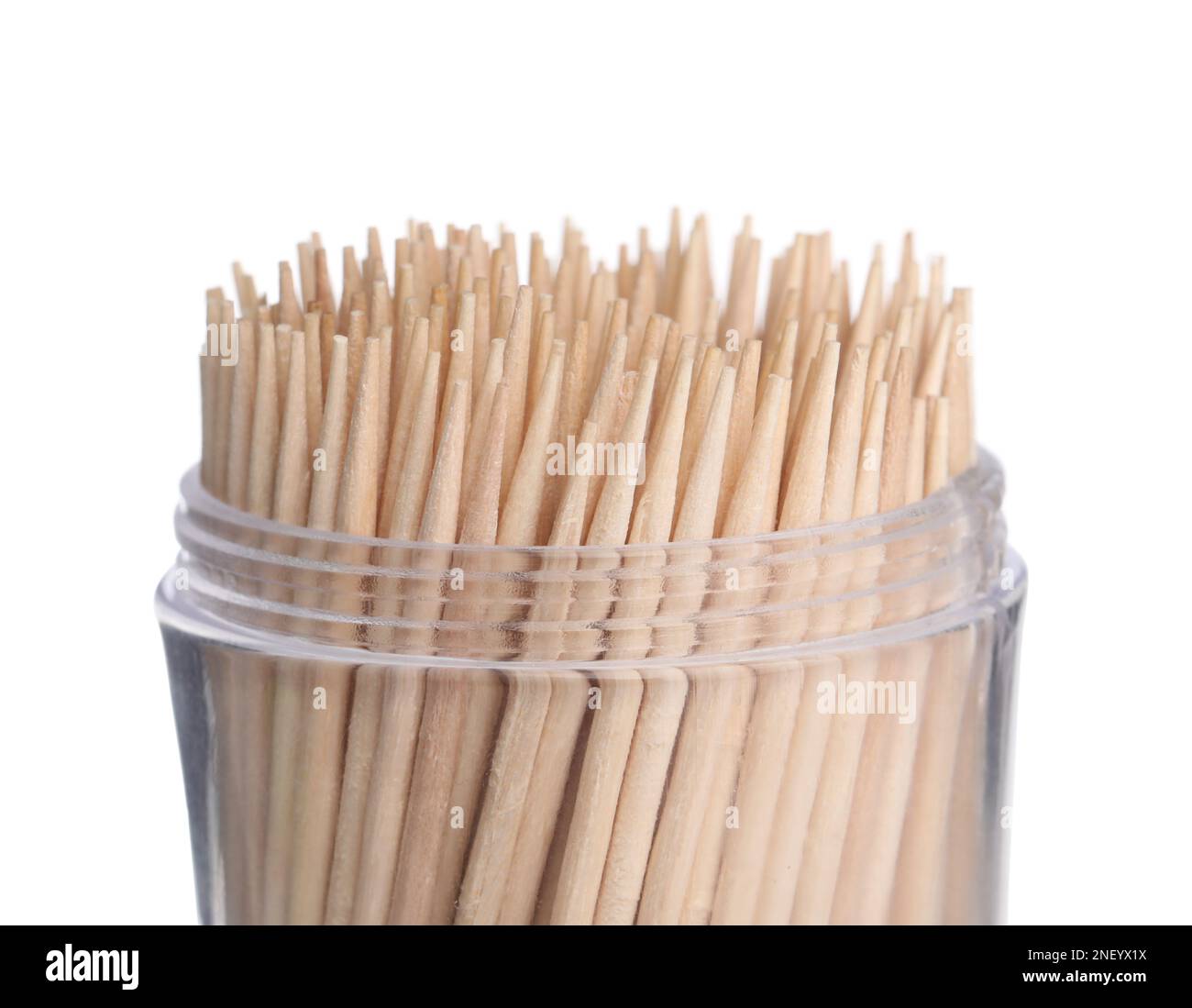 Wooden toothpicks in holder on white background, closeup Stock Photo