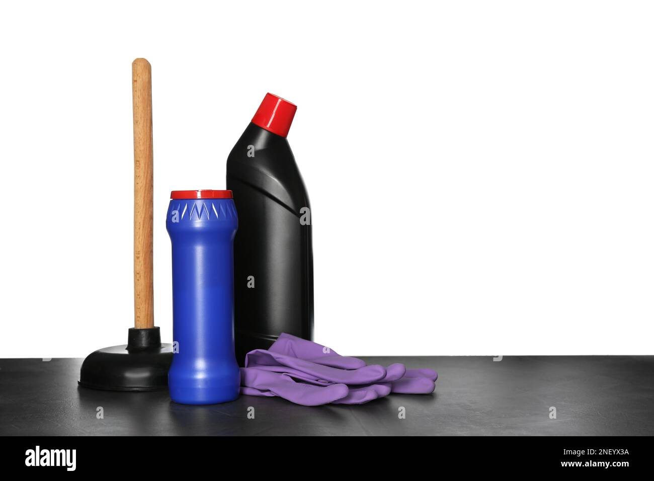 Cleanning Tools Table Composition with different toilet cleaning tools on black table against ...