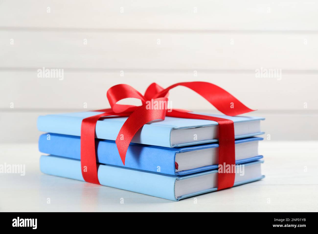 Stack books nobody ribbon hi-res stock photography and images - Alamy