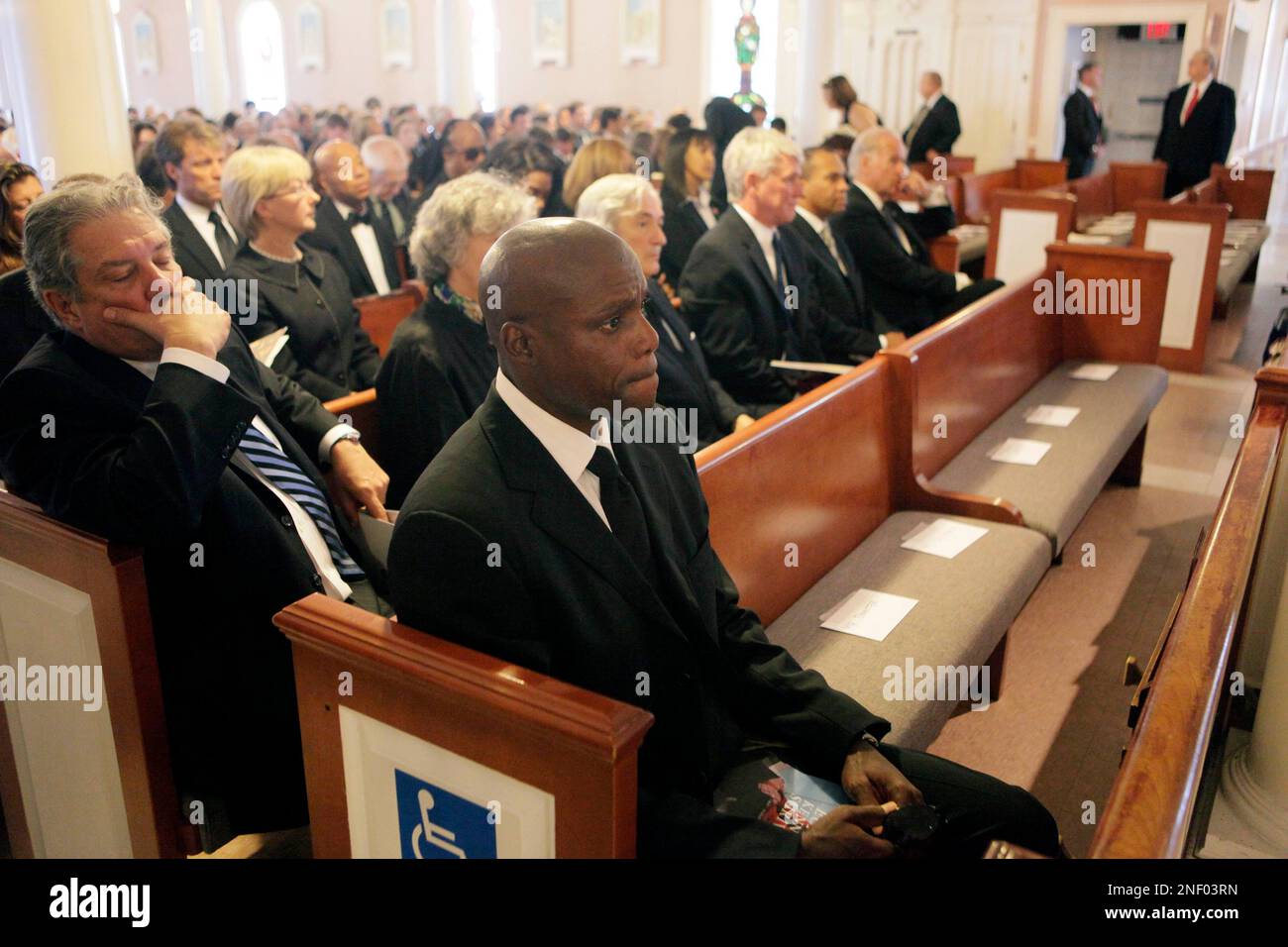 Olympian Carl Lewis attends the funeral of Eunice Kennedy Shriver at