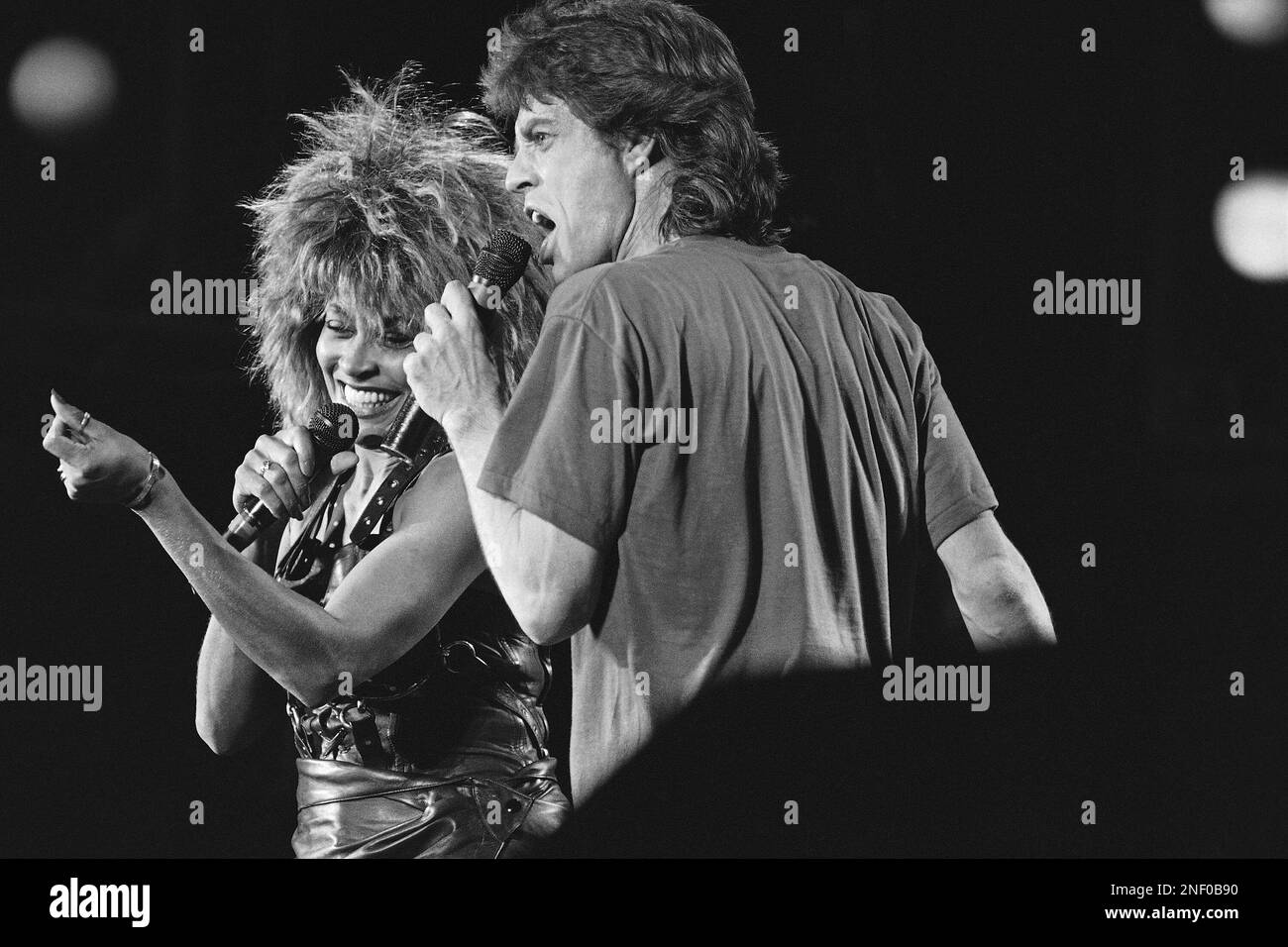 Singer Tina Turner Left And Mick Jagger Perform Together During Live singer-tina-turner-left-and-mick-jagger-perform-together-during-live