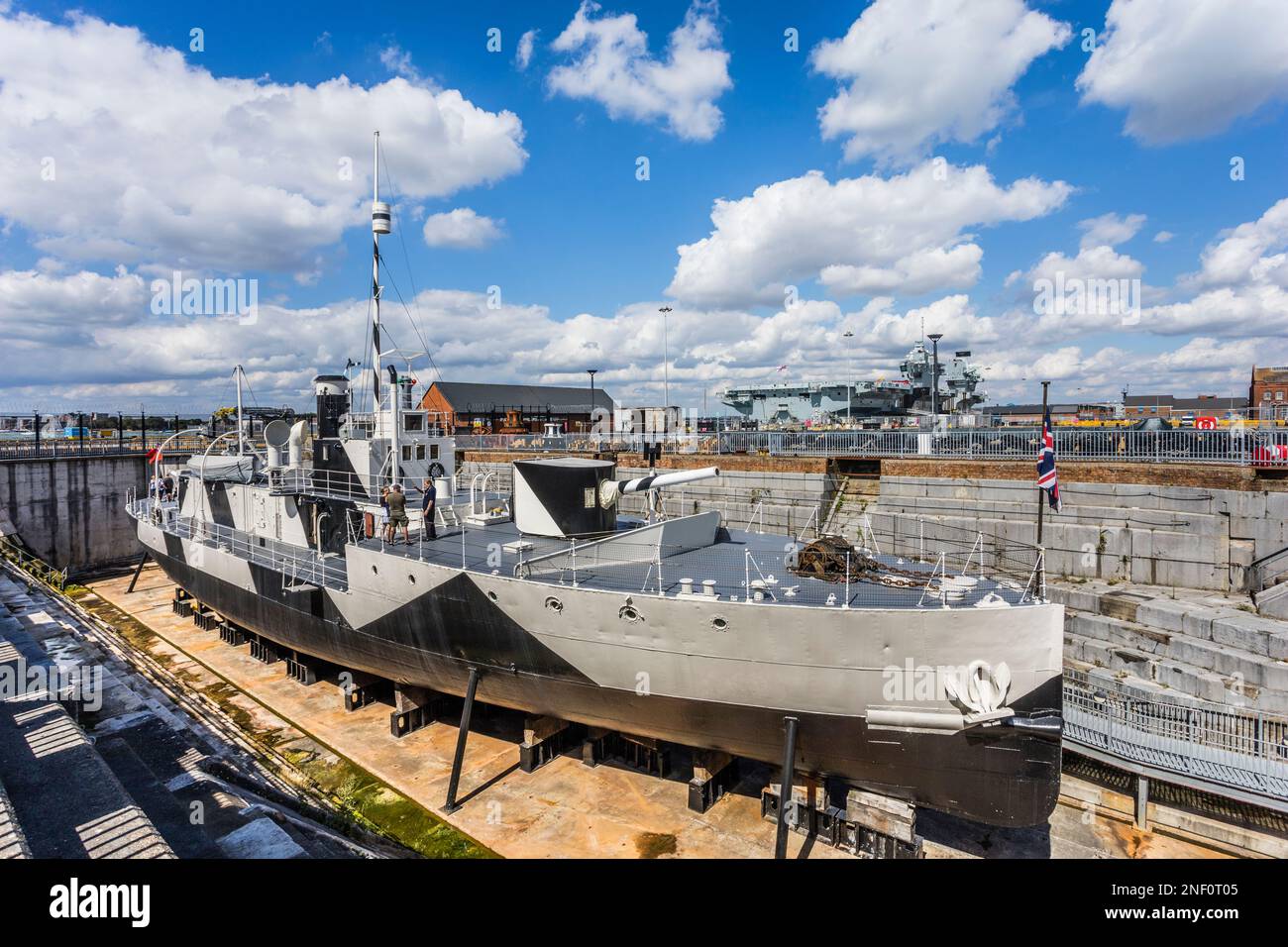 HMS M33, coastal bombardment 'monitor' gunboat, supported the landings at Gallipoli in 1915, exhibit in a dry dock at Portsmouth Historic Dockyard, Ha Stock Photo