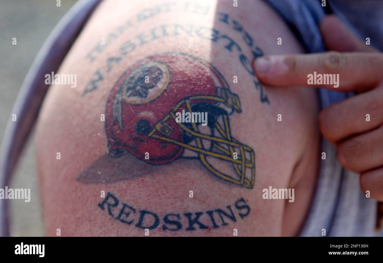 Washington Redskins football fan with Redskins tattoo on his back Virginia  Beach VA Stock Photo - Alamy