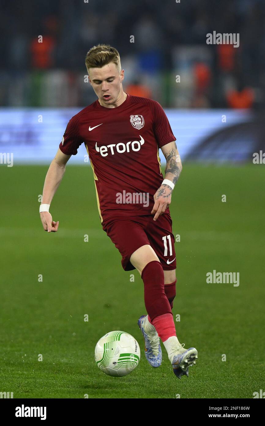 BUDAPEST, HUNGARY - MARCH 6: Claudiu Bumba of Kisvarda Master Good  challenges Henry Wingo of Ferencvarosi TC during the Hungarian OTP Bank  Liga match between Ferencvarosi TC and Kisvarda Master Good at