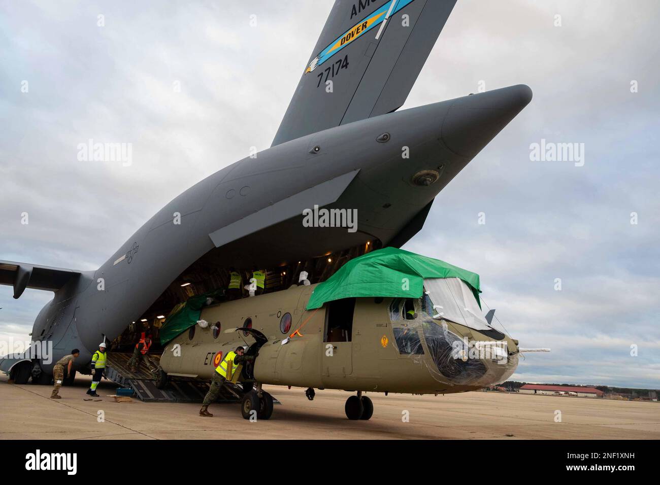 Torrejon Air Base, Spain. 16th Jan, 2023. A CH-47F Chinook helicopter is unloaded from a C-17 Globemaster III assigned to Dover Air Force Base, Delaware, during a foreign military sales mission at Torrejon Air Base, Spain, Jan. 16, 2023. The USA and Spain recognize the central importance of the NATO alliance in ensuring transatlantic peace and security. As NATO Allies for 40 years, the U.S. and Spain are steadfastly committed to providing NATO with ready forces and capabilities, strengthening transatlantic ties. Credit: U.S. Air Force/ZUMA Press Wire Service/ZUMAPRESS.com/Alamy Live News Stock Photo