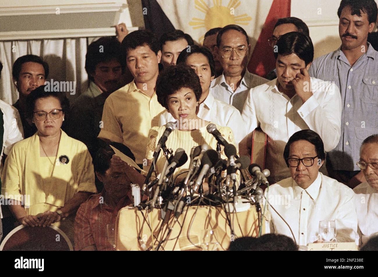 Opposition leader Corazon Aquino smiles to applause during her ...