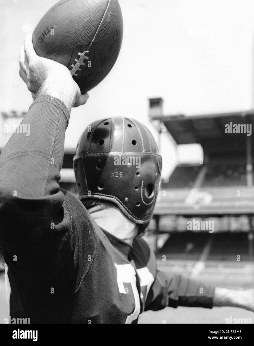 Sammy Baugh hurling one of his bullet passes on Sept. 25, 1942 in  Washington. The tall, handsome Gridiron star has appeared in the movies as  a western hero and once tried out