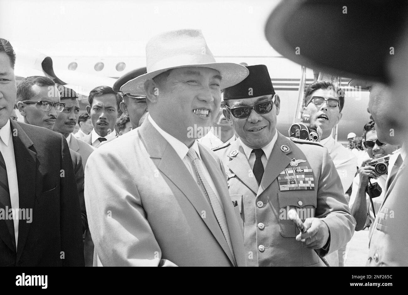 North Korean Prime Minister Kim Il Sung, left, is greeted by Indonesian ...