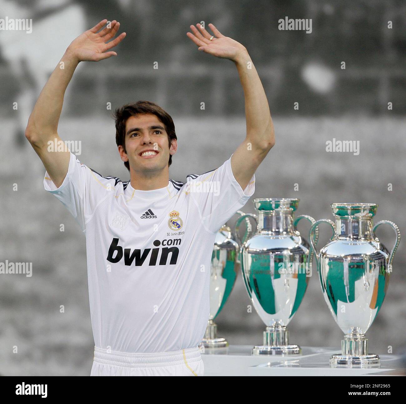 Real Madrid new soccer player Kaka from Brazil waves next to Real