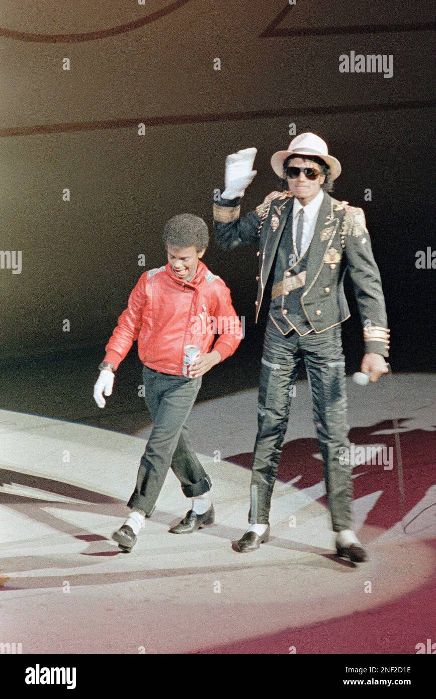 Michael Jackson, right, performs with Alfonso Ribeiro, of Broadway musical “The Dance Kid