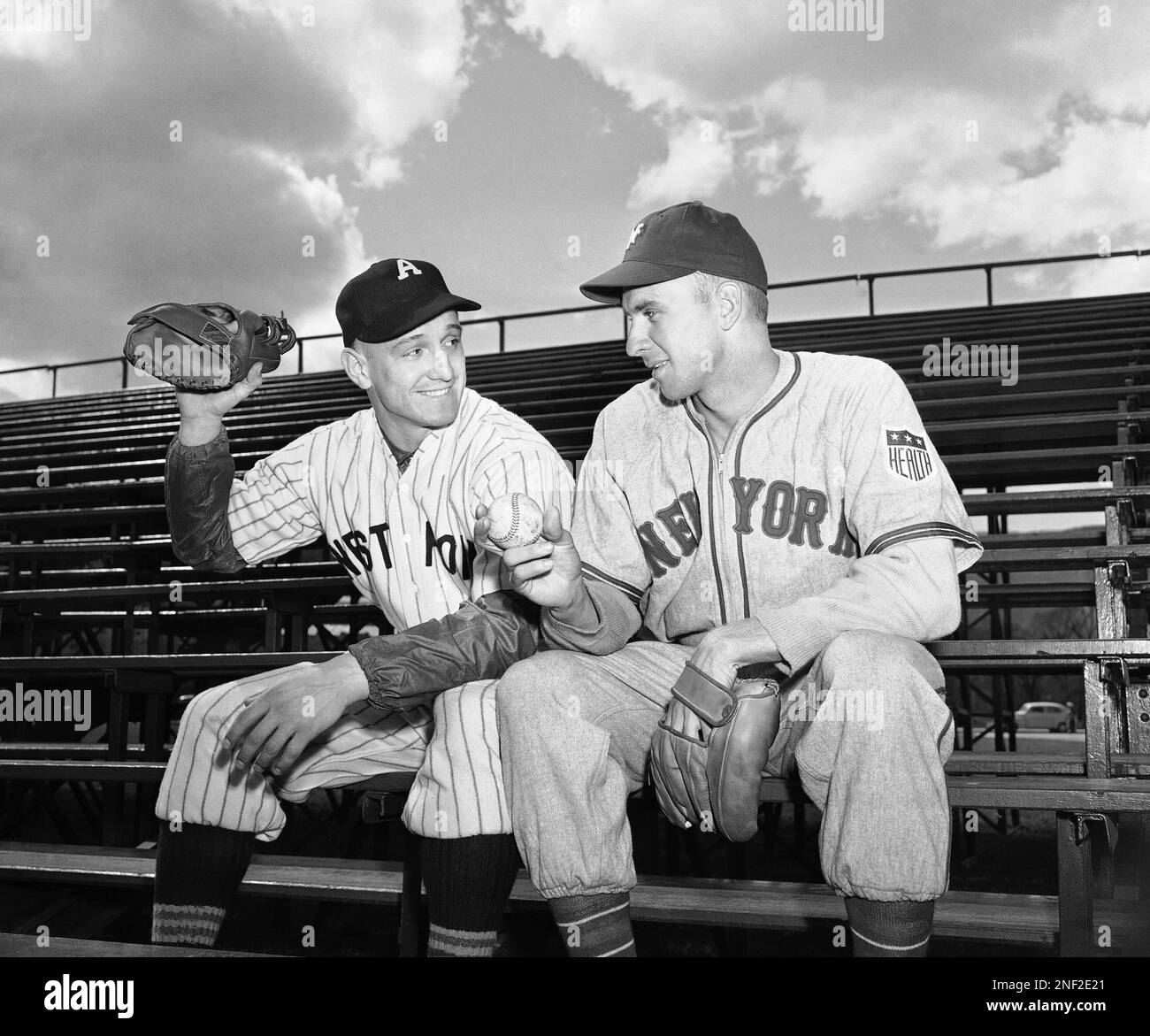 Henry “Hank” Mazur, left, star of Army’s 1941 football team, shows John